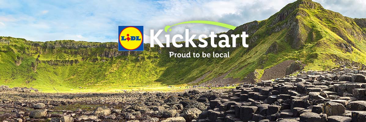 Lidl Kickstart logo over a scenic landscape with green hills and hexagonal rock formations.